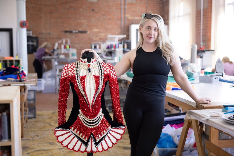 Dress designer and director Tomasina Smyth with one of her designs in Rosemount Factory. Photograph: Joe Dunne