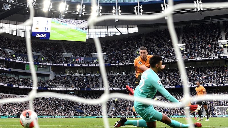 Matt Doherty scores Wolves’ first goal past Tottenham Hotspur goalkeeper Paulo Gazzaniga  during the Premier League match at Tottenham Hotspur Stadium. Photograph: Shaun Botterill/Getty Images