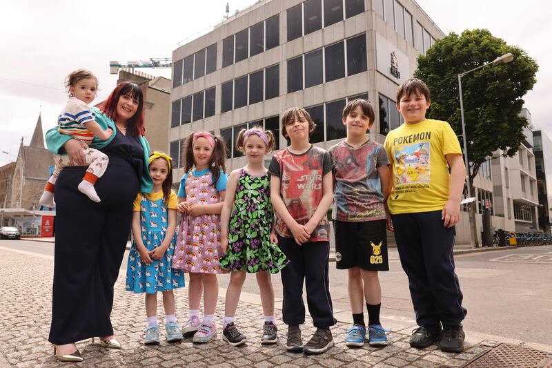 Rosemary Murphy pictured with seven of her 12 children (from left), Dion (17 months), Maeve (4), Lara (7), Britney (5), Skyler (8), Cody (10) and Finn (11). Photograph: Dara Mac Dónaill







