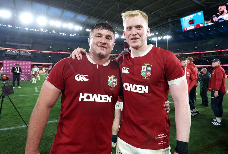 Lions Thomas Clarkson and Jamie Osborne celebrate after the game. Photograph: Billy Stickland/Inpho