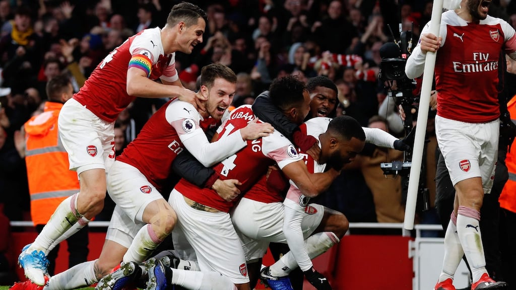 Alexandre Lacazette celebrates scoring against Tottenham Hotspur at the Emirates Stadium. Photograph: Getty Images