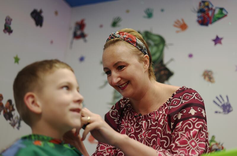 Maggie Radecka, at work in her hair salon in Inchicore, Dublin. Photo: Bryan O Brien