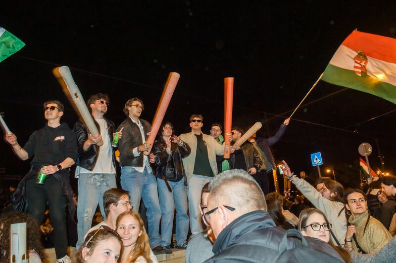 People celebrate in the streets after Hungarian prime minister Viktor Orbán conceded defeat. Photograph: Ferenc Isza/AFP/Getty Images