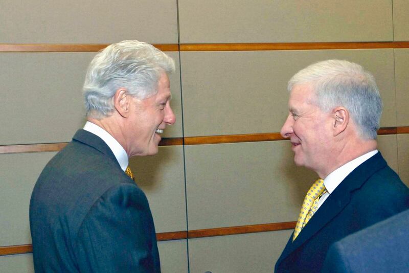 Powerbroker: Chris Maccabe (right) with former US president Bill Clinton. 