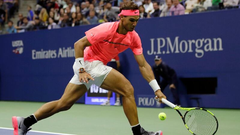 Nadal chases a shot during his win over Mayer. Photo: Julio Cortez/AP
