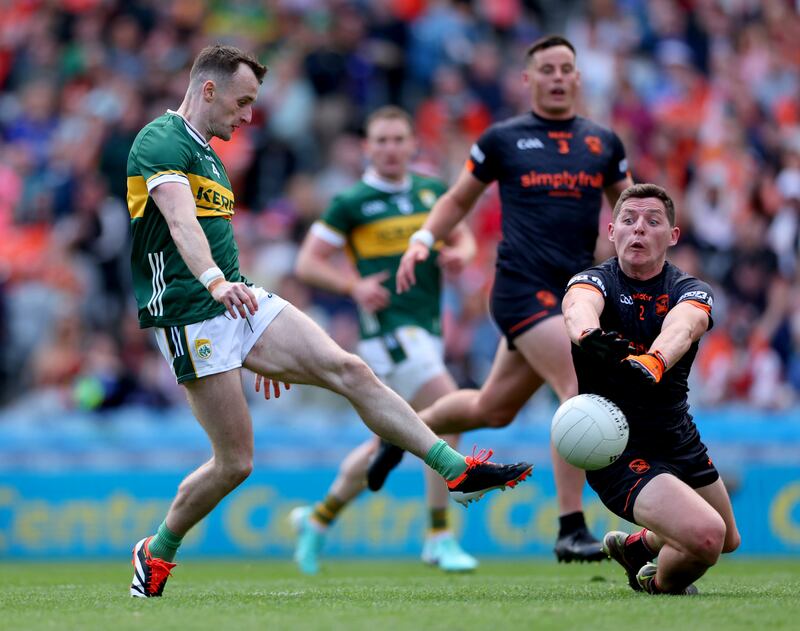 Kerry's Tom O'Sullivan is closed down Armagh's Paddy Burns during their All-Ireland SFC semi-final. Photograph: James Crombie/Inpho