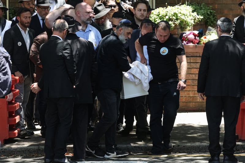 Mourners carry the coffin of 10-year-old Matilda, who was killed in the December 14 Bondi Beach shooting attack. Photograph: David Gray/AFP/Getty Images