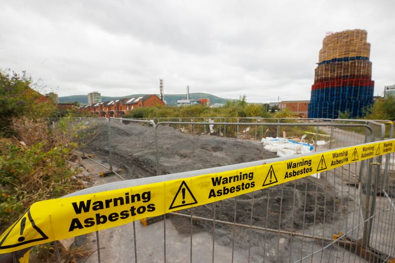 Fenced off area warning of asbestos close to a bonfire on Broadway Industrial Estate off Donegal Road in south Belfast. Photograph: Liam McBurney