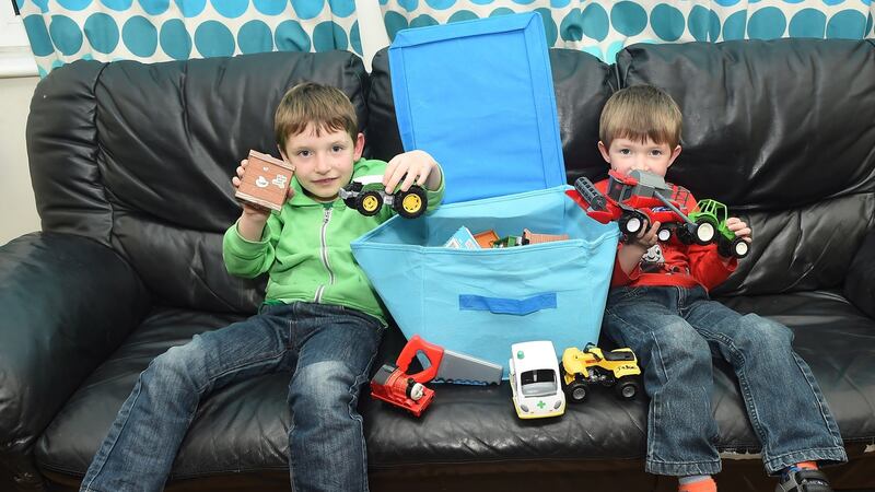 Alex, aged 7, and Jake, aged 4, with their Share Box, one of the many tips their mother, Donna, picked up at the Parenting Plus course in Ballybay Co Monaghan. Photograph: Philip Fitzpatrick