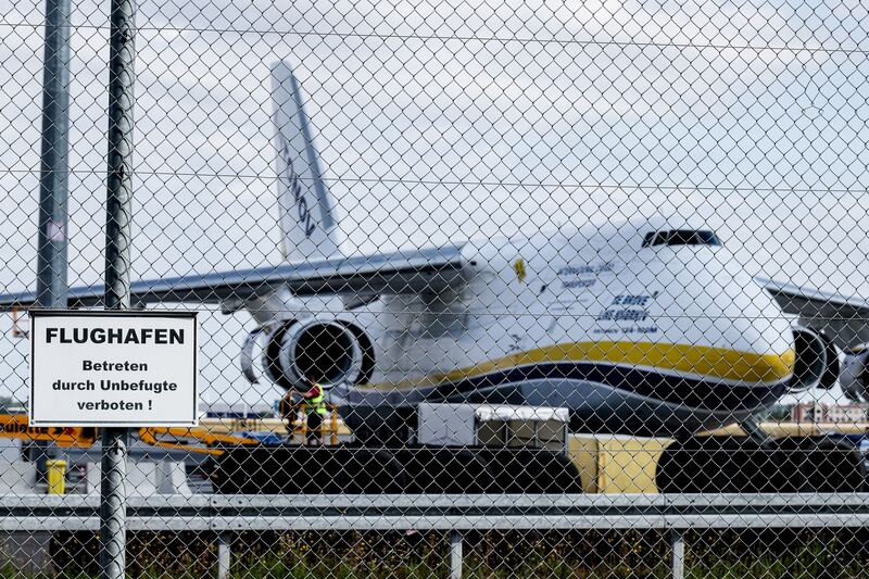 A Ukrainian Antonov cargo plane behind a security fence at Leipzig/Halle Airport, Germany. Photograph: EPA