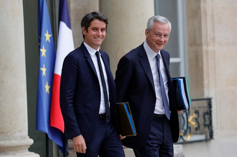 Gabriel Attal and Bruno Le Maire pictured following a cabinet meeting in Paris in 2023. Photograph: Geoffroy van der Hasselt/AFP/Getty