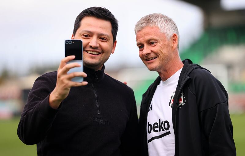 Manager Ole Gunnar Solskjær takes a selfie with a fan. Photograph: Ryan Byrne/Inpho