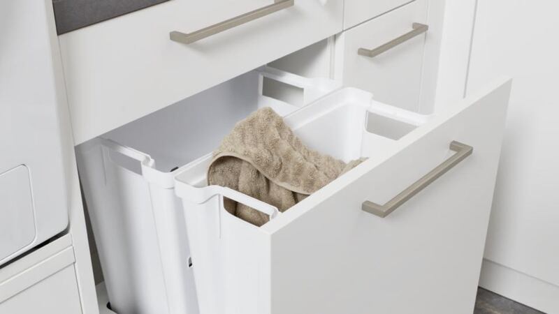 Allocated deep drawers, like these by Kube Kitchens,  to each member of the family for their laundry.