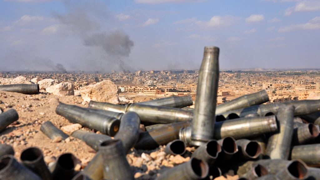 Smoke billows from the eastern Syrian city of Deir al-Zor  during an operation by   Syrian government forces against Islamic State on Thursday. Photograph: AFP/Getty Images