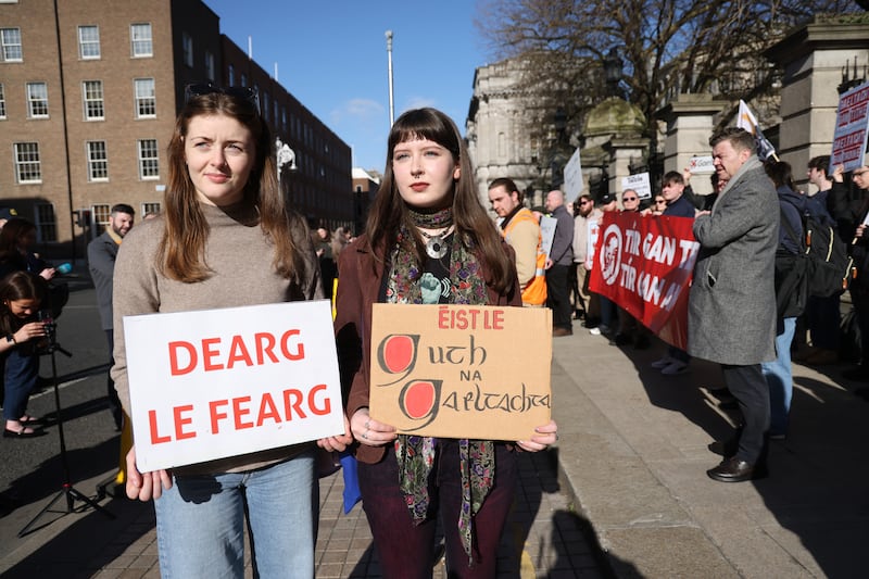 Caoimhe Ní Bhradáin and Aifric Nic Niallais at Leinster House during Tuesday's protest over housing in Gaeltacht areas. Photograph: Bryan O’Brien
