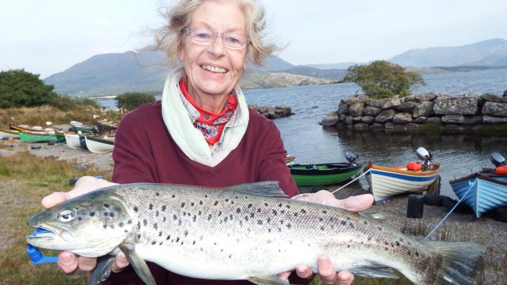 Mariet Timmermans from Holland with an excellent sea trout of 4lb caught on Lough Currane, Waterville, Co Kerry, on the fly. photograph: vincent appleby