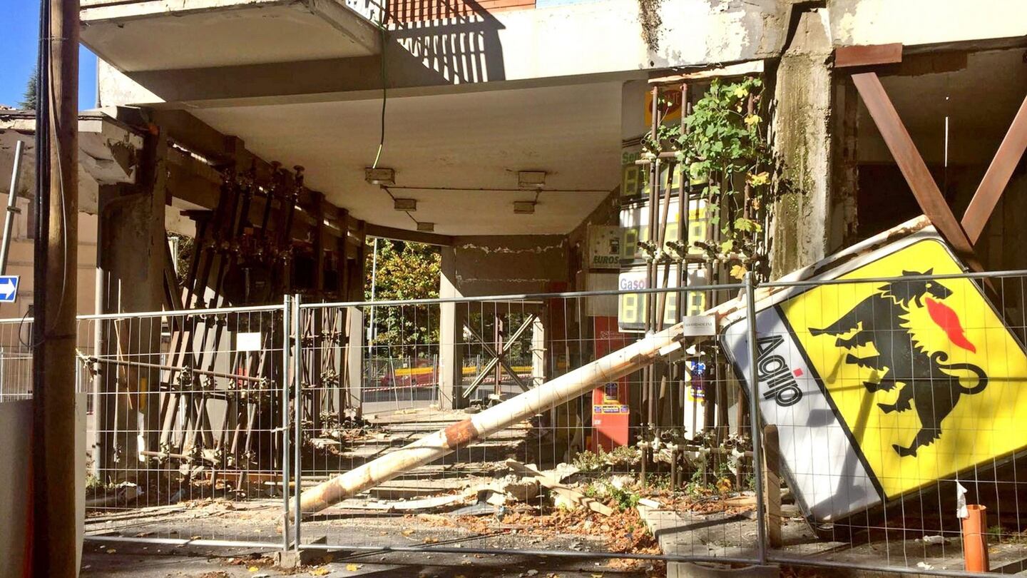 Another building that was damaged in L’Aquila. Photograph: Alberto Orsini/EPA