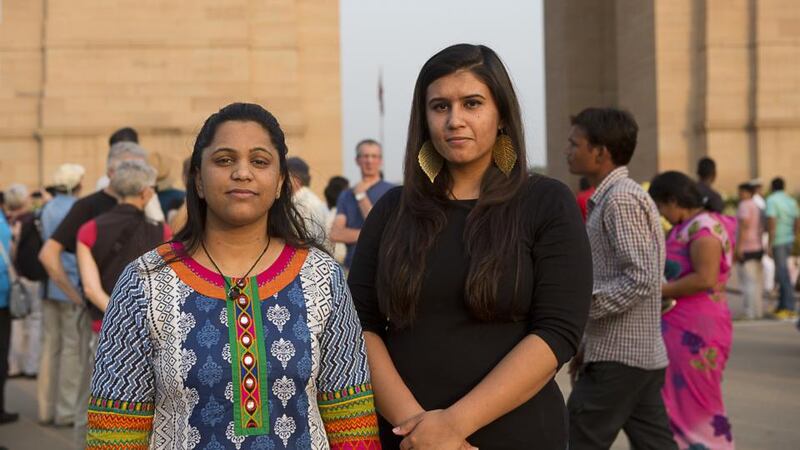Sheetal Gupta (27), left and Avanti Kumar (23), right, at the historical monument India Gate in New Delhi. Photographs: Arkaprava Ghosh / Barcroft India via Getty Images and Natisha Mallick