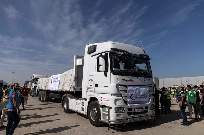 Aid convoy trucks cross the Rafah border into Gaza from the Egyptian side on Saturday. The aid convoy was organised by a group of Egyptian NGOs. Photograph: Mahmoud Khaled/Getty Images