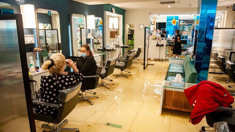 Peter Mark hair salon during heavy flooding on Winthrop Street, Cork city. Photograph: Daragh Mc Sweeney/Provision