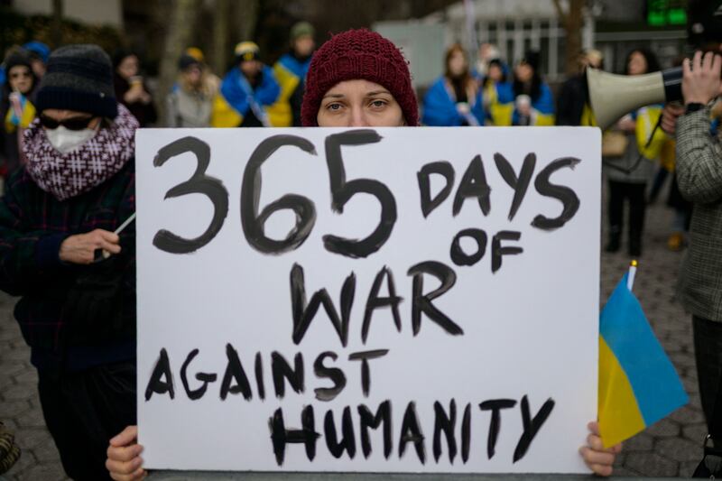 Pro-Ukraine and anti-war protesters demonstrate to mark the first anniversary of the Russian invasion of Ukraine outside United Nations headquarters in New York. Photograph: Angela Weiss/AFP