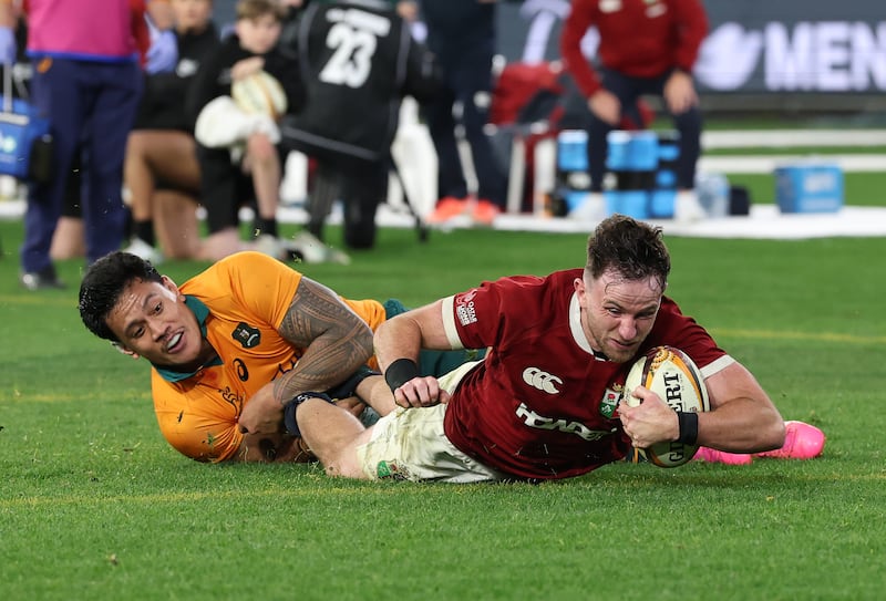 Hugo Keenan goes over to secure victory for the British and Irish Lions against Australia in the second Test at the MCG. Photograph: David Rogers/Getty Images