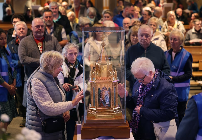 People queue for the Veneration of the Relics of Saint Bernadette to Our Lady of Victories Church, Ballymun Road, Dublin. Photograph: Dara Mac Dónaill / The Irish Times
