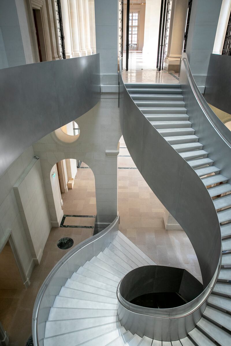 This 21st century burnished steel and aluminium staircase unifies four centuries of labyrinthine constructions at the Bibliothèque nationale de France. Photograph: Laurent Julliand