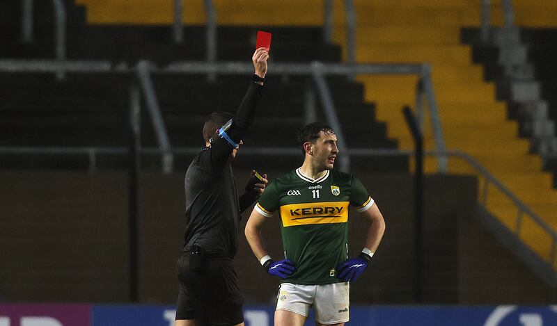 Referee Barry Tiernan gives Kerry's Paudie Clifford his marching orders against Cork. Photograph: Bryan Keane/Inpho