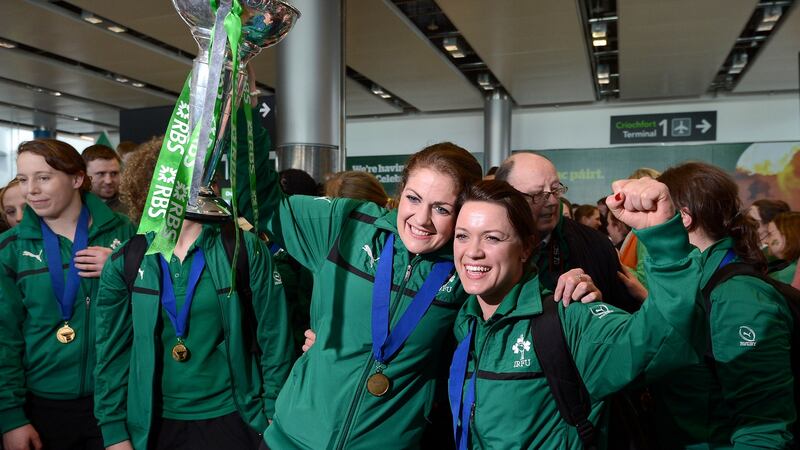 Fiona Coughlan, captain of the Ireland Women’s Rugby team, with Lynne Cantwell, Ireland’s most capped player, on March 8th, 2013 arriving home from Milan after winning the RBS 6 Nations Cup and securing an historic first Grand Slam. Photograph: Brenda Fitzsimons
