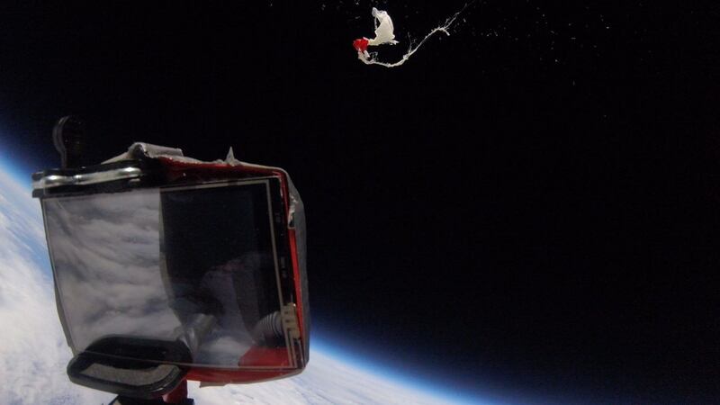 Space Balloon bursts releasing camera capturing  images of outer space. Photograph: International Space University