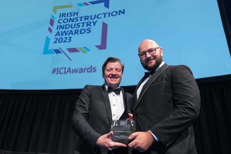 Mark Dunne, director at Globoserv, presents the BIM initiative of the year award to Admir Olovcic, Jones Engineering