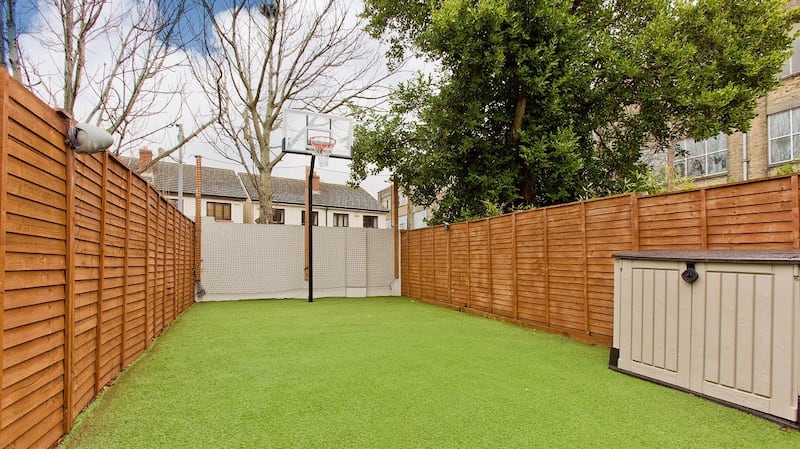 The rear garden at 294 South Circular Road, Dublin 8 is laid out with artificial grass.