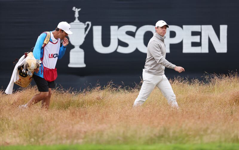 Rory McIlroy and caddie Harry Diamond on  the 14th hole during the final round of the 122nd US Open at Brookline, Massachusetts. Photograph: 