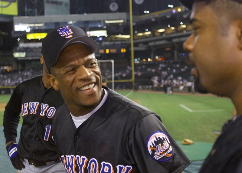 Rickey Henderson on the field with New York Mets team-mates before a play-off game against the Arizona Diamondback in Phoenix on October 6th, 1999. Photograph: Ozier Muhammad/New York Times