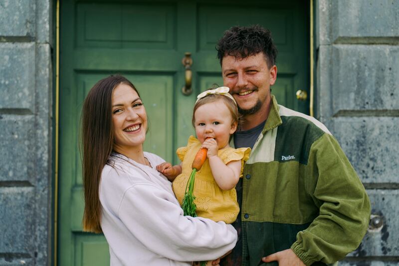 Rowan Barlow and Laoise Murtagh with their daughter Danu at Ballinderry Park, Kilconnell, Co Galway. Photograph: John Margetts