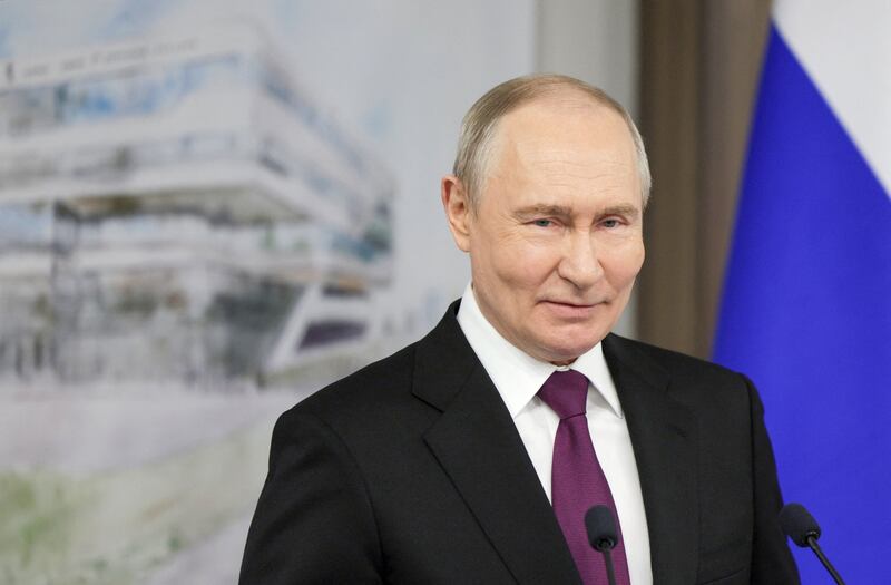 In this pool photograph distributed by the Russian state agency Sputnik, Russia's president Vladimir Putin visits a multifunctional sports complex of the Anatoly Rakhlin Olympic Reserve Sports School in Saint Petersburg on Monday. Photograph: Gavriil Grigorov/ Pool/ AFP via Getty Images