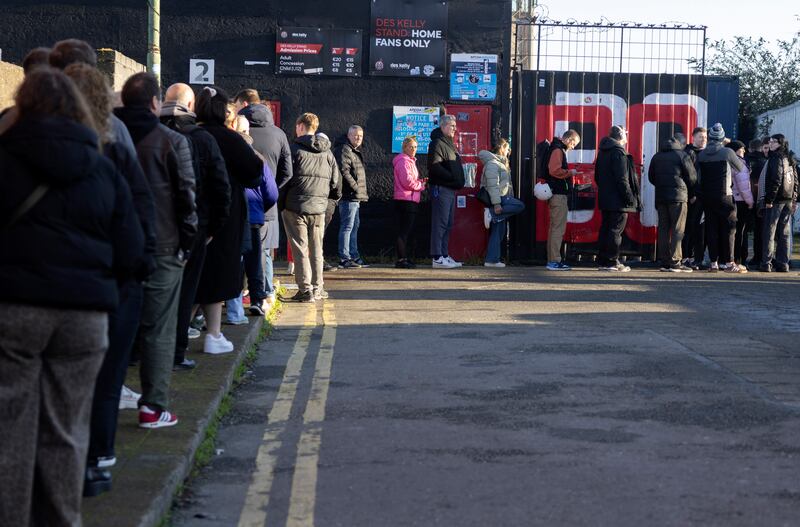 Crowds line up around the block near Dalymount stadium to purchase the newly announced Bohemians x Kneecap collaboration for the Bohs’ away jersey. Photograph: Chris Maddaloni/The Irish Times