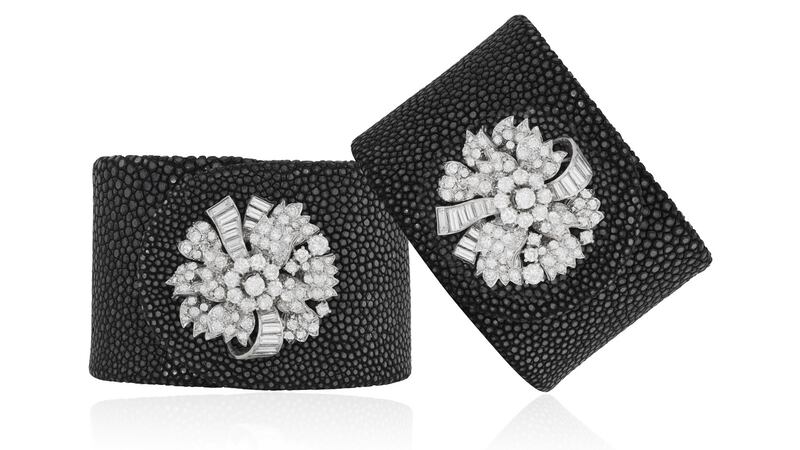 Pair of diamond brooches fitted on guluchat to become a set of cuffs (€5,000–€7,000) at  Adams.