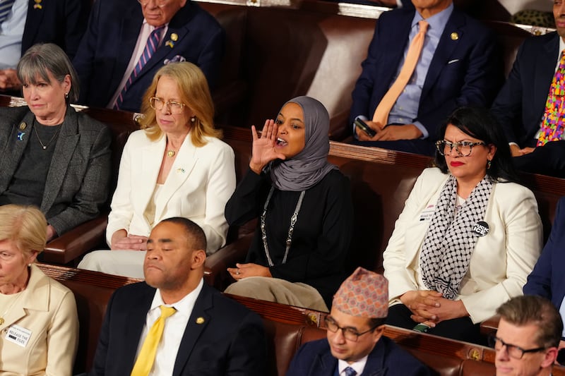 Democrat Ilhan Omar shouts at US president Donald Trump as he delivers his address. Photograph: Tierney L. Cross/The New York Times                 