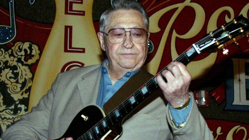 Scotty Moore playing music at the second annual Ponderosa Stomp in New Orleans.  Photograph: AP Photo/Judi Bottoni
