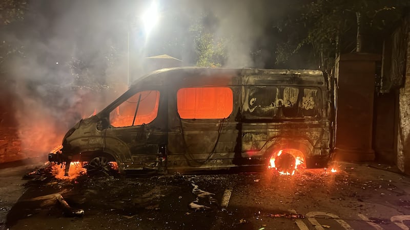 The burned-out shell of a Garda van. Photograph: Cian O'Connell