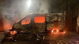 ‘Hold your ground’: Six arrested as Garda van burned at Citywest Hotel