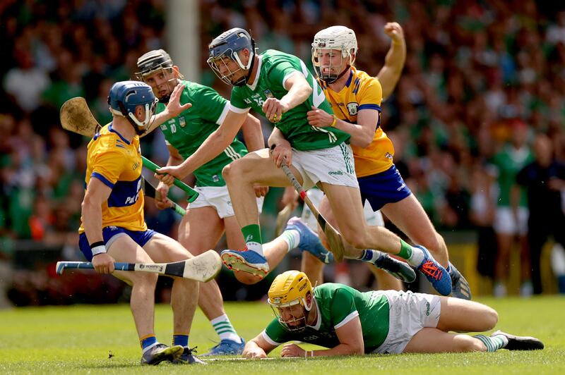 Limerick’s David Reidy and Clare's Adam Hogan in action during last year's Munster final at the TUS Gaelic Grounds. Photograph: James Crombie/Inpho