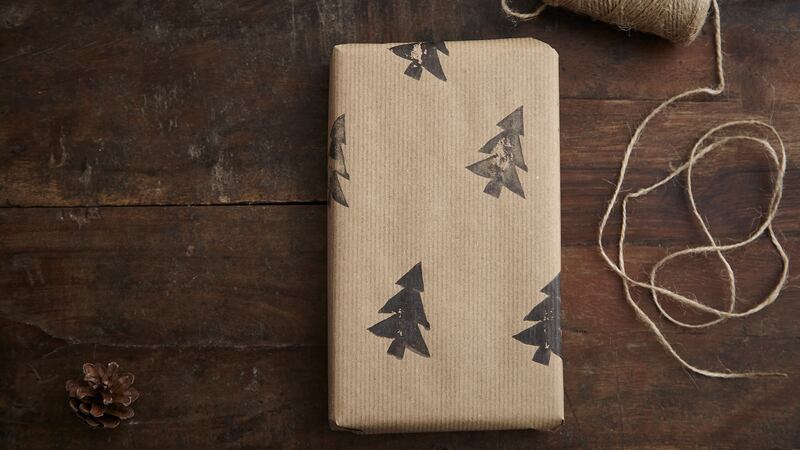 “For perfectly-cut wrapping paper, use a rotary or pizza cutter on a flat surface or chopping board instead of your usual scissors.” Photograph: Getty Images