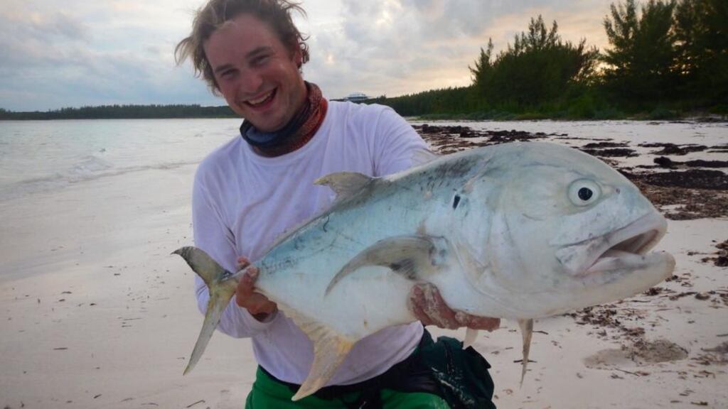 Got your back, jack: Delphi Club manager Max Woolnough with a magnificent jack fish caught of Abaco Island, Bahamas