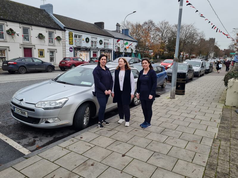 Pharmacist Carmel Collins (centre) with Adare Pharmacy staff members Antoinette Collins (left) and Geraldine O Grady (right). Photograph: Barry Roche