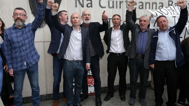 Defendants in the Jobstown trial, from left,  Ken Purcell, Scott Masterson, Paul Murphy TD, Michael Murphy, Kieran Mahon, Frank Donaghy and Michael Banks leave the Dublin Circuit Criminal Court after they were all found not guilty. Photograph:  Collins Courts