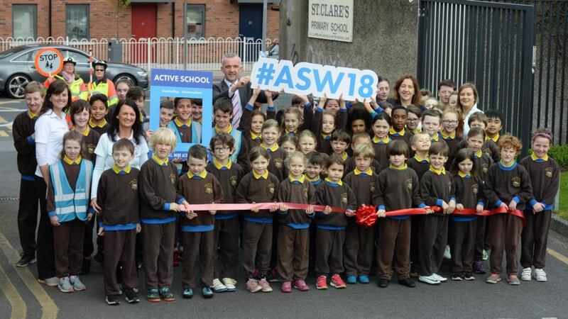 Prof Donal O'Shea with pupils and teachers from St Claire's Primary School Harolds Cross where he launched the Active School week with coordinator Karen Cotter. Photograph: Cyril Byrne