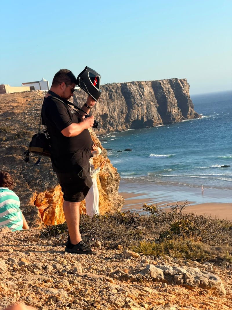 One man brought a welder’s mask and was using it to take pictures of the eclipse. Photograph: Conor Pope